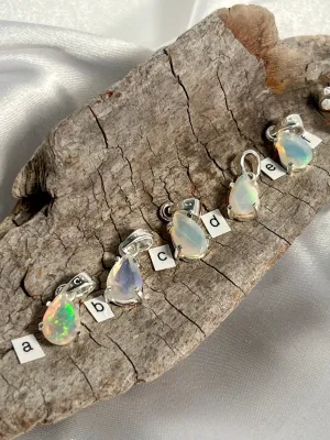 Dainty Prong Set Facet Cut Teardrop Shaped Ethiopian Opal Pendant