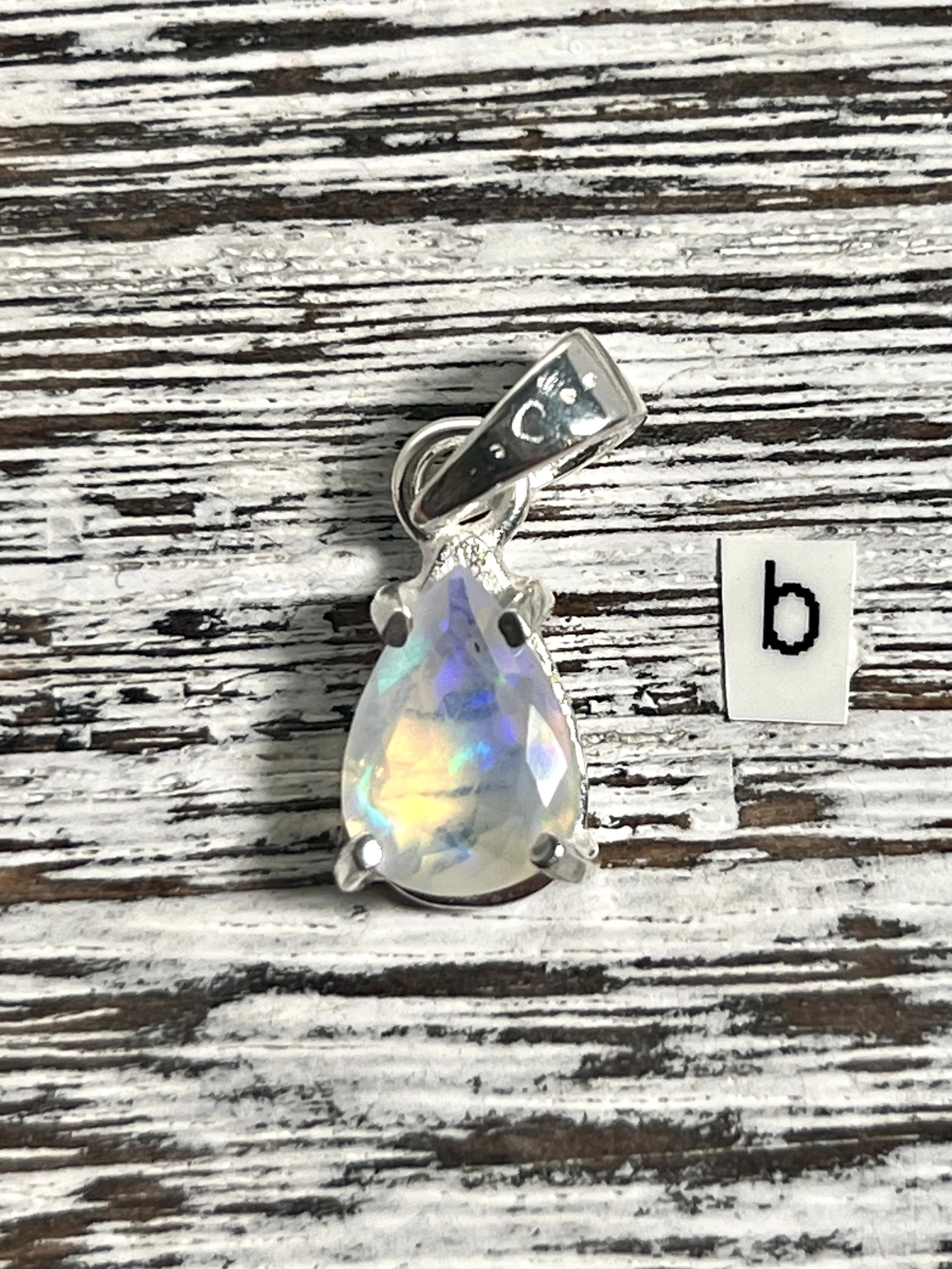 Dainty Prong Set Facet Cut Teardrop Shaped Ethiopian Opal Pendant