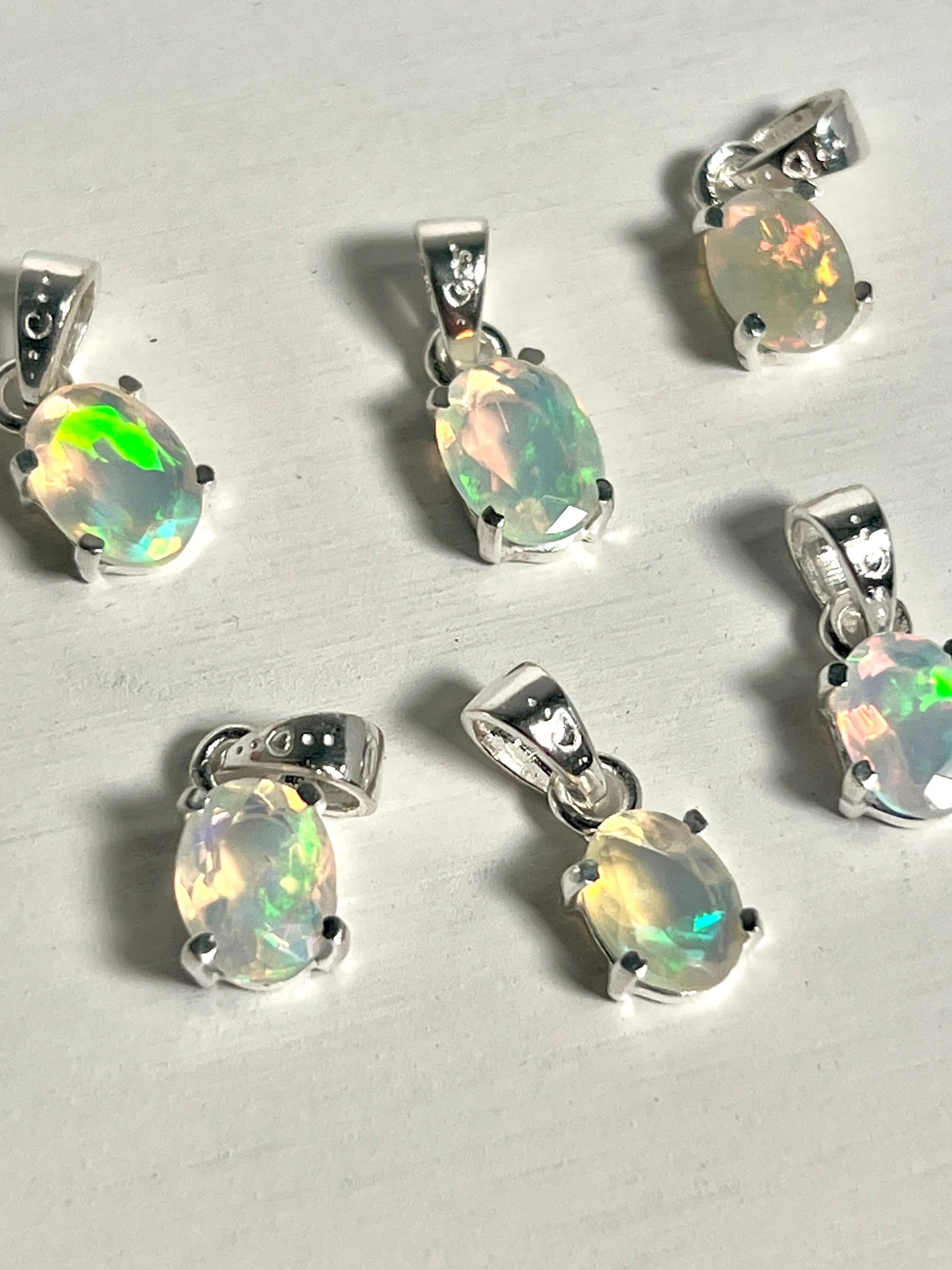 Tiny Facet Cut Prong Set Ethiopian Opal Pendant