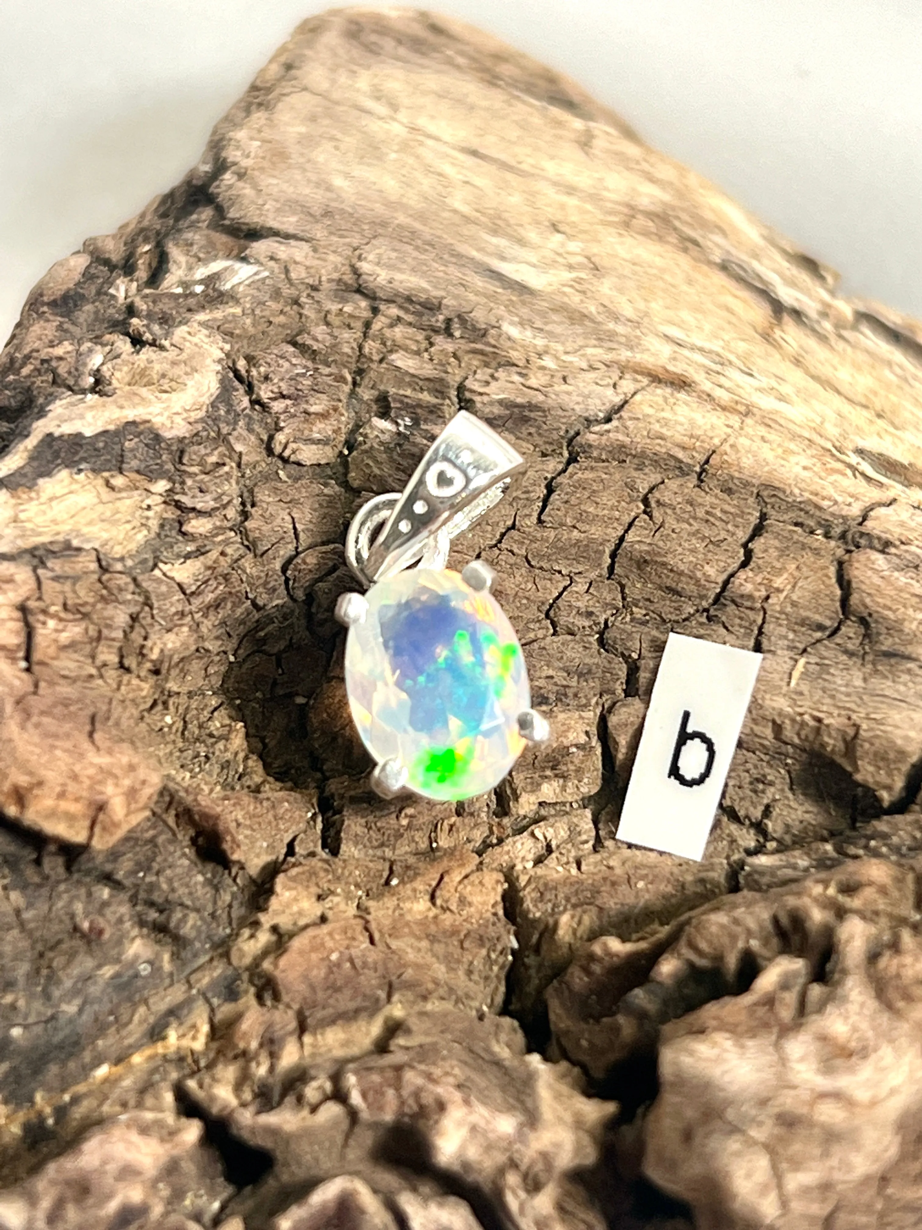 Tiny Facet Cut Prong Set Ethiopian Opal Pendant