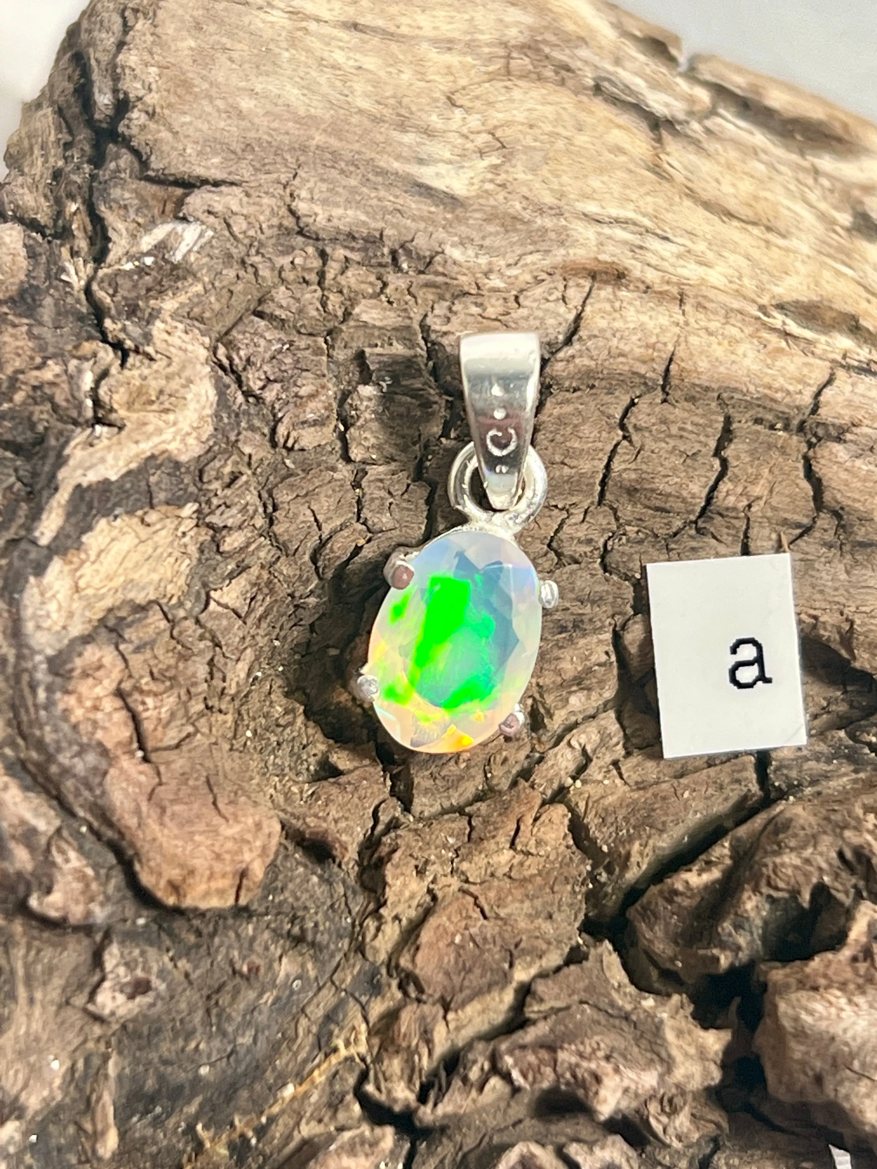 Tiny Facet Cut Prong Set Ethiopian Opal Pendant