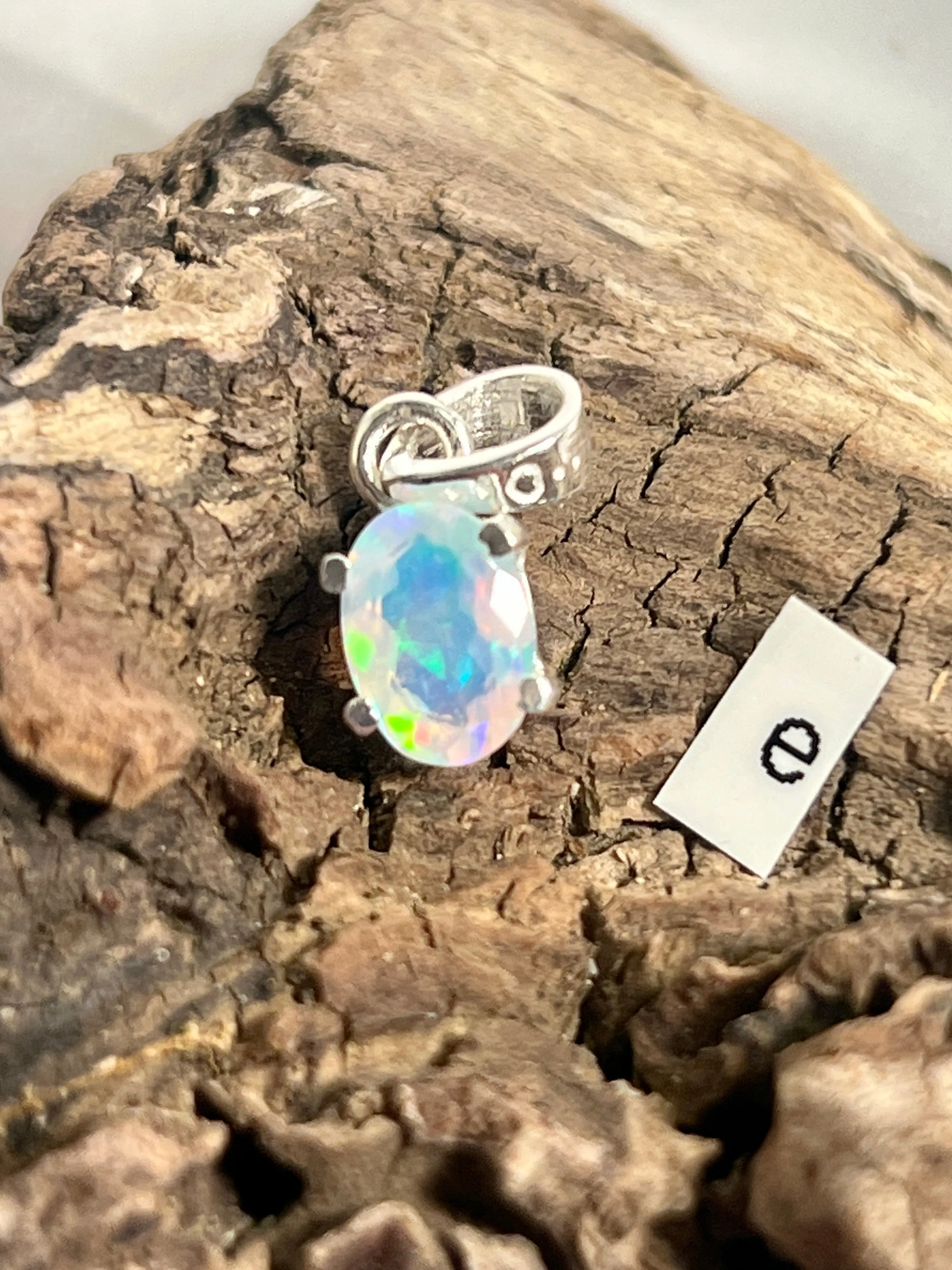 Tiny Facet Cut Prong Set Ethiopian Opal Pendant