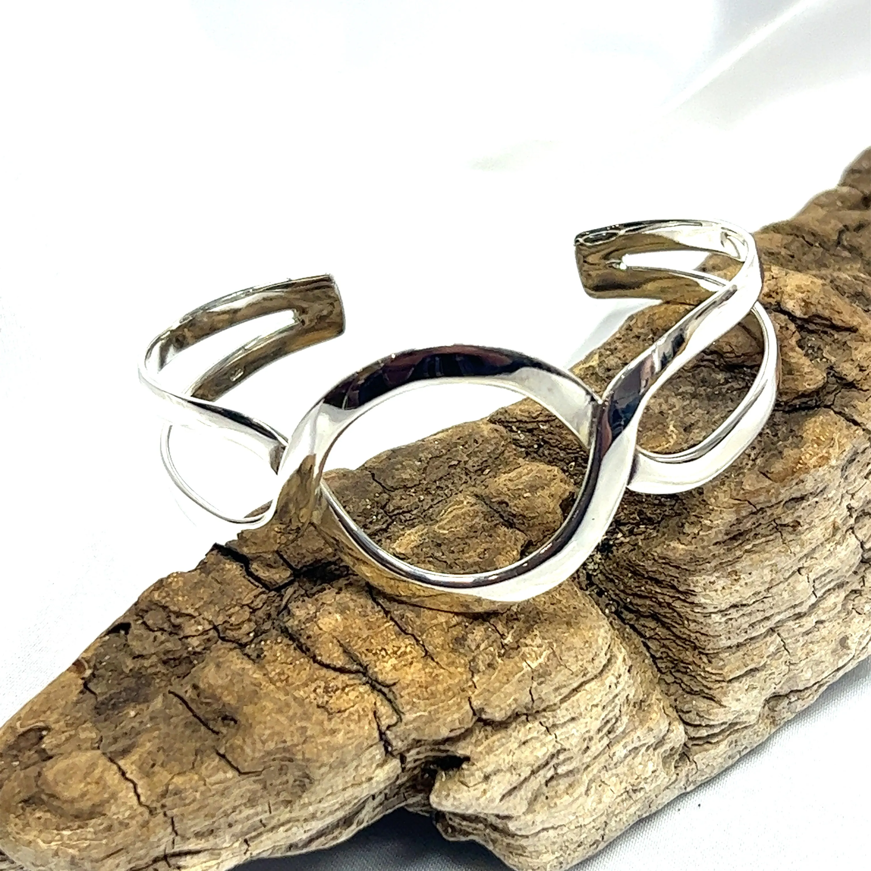 Trendy Twisted Cuff with Circle Design