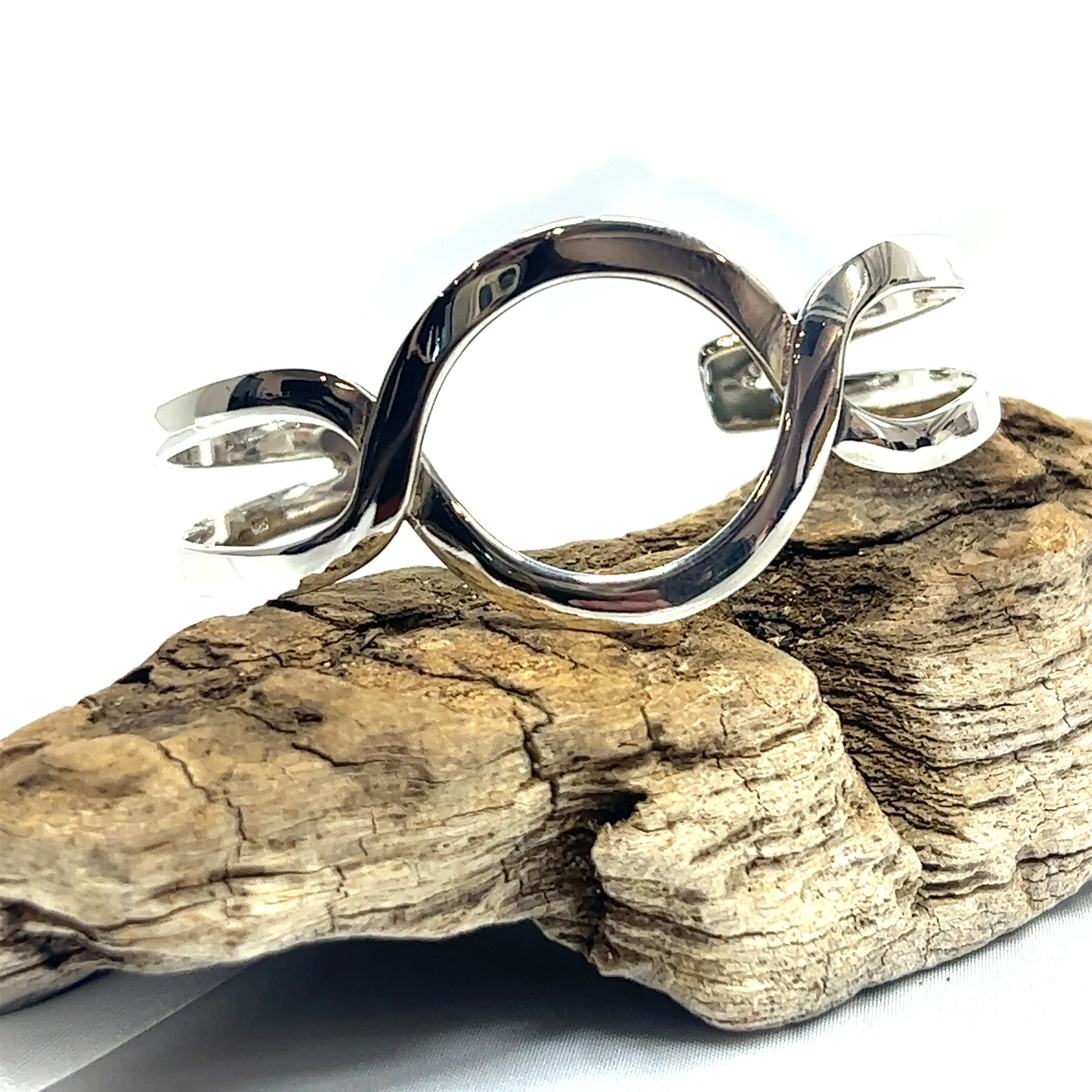 Trendy Twisted Cuff with Circle Design